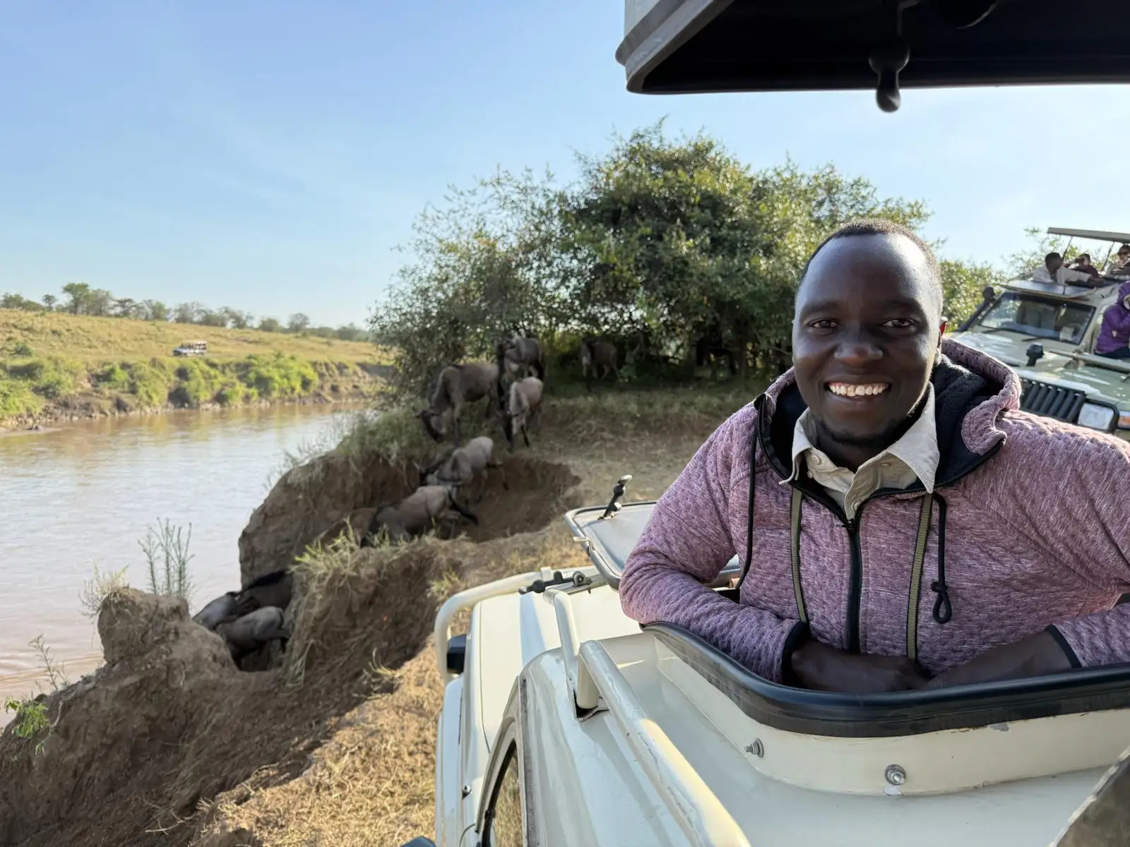 Our guests from the US experienced a Northern Serengeti safari and witnessed the dramatic wildebeest crossing firsthand." When the wildebeest busted through the bushes next to our truck we were stunned. " 